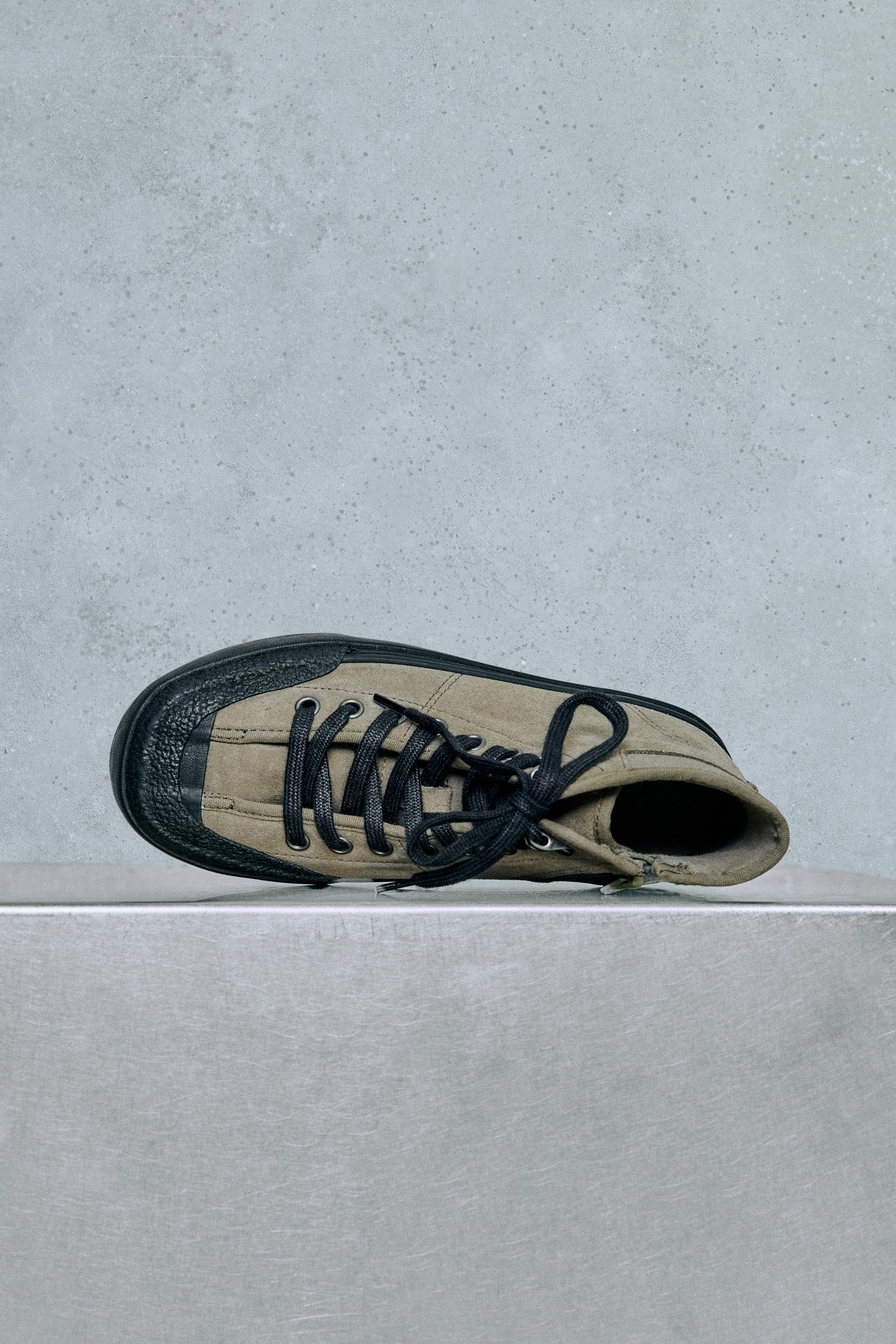 BASKETS MONTANTES EN CUIR
